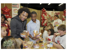 High School Musical actors serving lunch as part of communications campaign